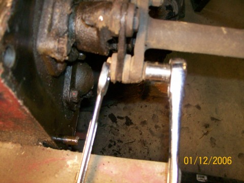 Removing driveshaft tapered bolts and rubber washers (1424 x 1066).jpg