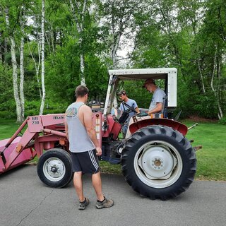 Checking out the tractor.jpg